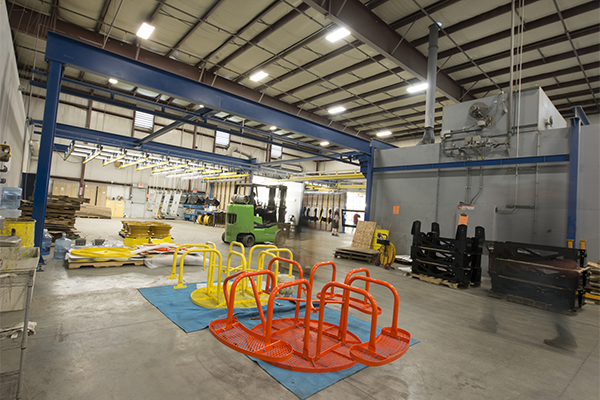 Our powder coating warehouse with a completed project in the foreground
