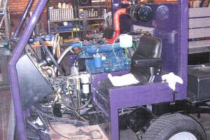 custom powder coating job on a purple cab with silver wheels and a black frame