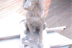 a powder coated dog statue