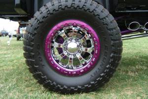Close up picture of a powder coated rim on a truck