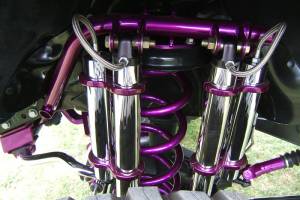 Custom powder coated suspension on a lifted truck