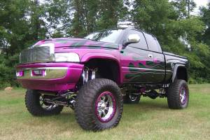 A lifted truck with various powder coated parts