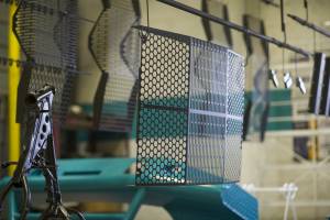 Powder coated barrier